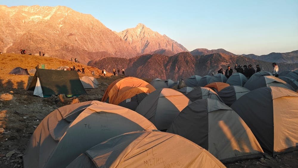 Tents at a mountain campsite at sunrise